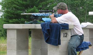 competition shooter using a BulzEyePro Optical Booster
